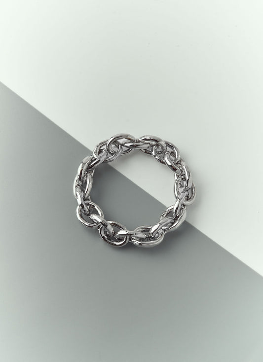 Close-up of chunky silver chain bracelet